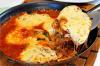 MEIA PARMEGIANA DE FRANGO 