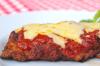 Bife de carne à parmegiana 